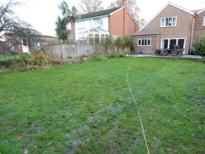 Lawns and Drainage in Guildford, Surrey - Construction of a high grade lawn using a rootzone soil medium after drainage was installed and areas raised. Lawns & Turfing - MDB Landscapes