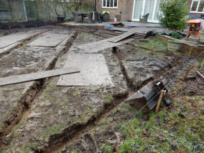 Lawns and Drainage in Guildford, Surrey - Construction of a high grade lawn using a rootzone soil medium after drainage was installed and areas raised. Lawns & Turfing - MDB Landscapes
