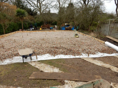 Lawns and Drainage in Guildford, Surrey - Construction of a high grade lawn using a rootzone soil medium after drainage was installed and areas raised. Lawns & Turfing - MDB Landscapes