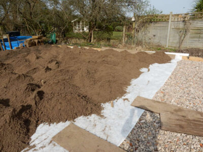 Lawns and Drainage in Guildford, Surrey - Construction of a high grade lawn using a rootzone soil medium after drainage was installed and areas raised. Lawns & Turfing - MDB Landscapes