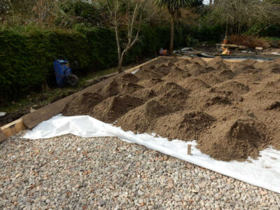 Lawns and Drainage in Guildford, Surrey - Construction of a high grade lawn using a rootzone soil medium after drainage was installed and areas raised. Lawns & Turfing - MDB Landscapes