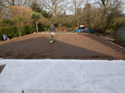 Lawns and Drainage in Guildford, Surrey - Construction of a high grade lawn using a rootzone soil medium after drainage was installed and areas raised. Lawns & Turfing - MDB Landscapes