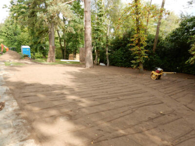 Lawn Construction in Oxshott, Surrey - Large areas of garden lawns struggling with drainage issues. Areas reduced in levels first, land drainage installed followed by the importaion of rootzone and completed areas re-turfed. Lawns & Turfing - MDB Landscapes