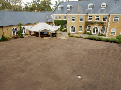 Lawn Construction in Oxshott, Surrey - Large areas of garden lawns struggling with drainage issues. Areas reduced in levels first, land drainage installed followed by the importaion of rootzone and completed areas re-turfed. Lawns & Turfing - MDB Landscapes