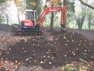 Grass Seeding in Dippenhall, Surrey - Recontouring of large areas of garden with imported topsoil and areas re-seeded on completion. Lawns & Turfing - MDB Landscapes