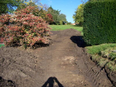 Grass Seeding in Dippenhall, Surrey - Recontouring of large areas of garden with imported topsoil and areas re-seeded on completion. Lawns & Turfing - MDB Landscapes