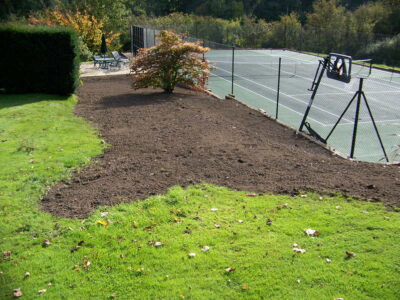 Grass Seeding in Dippenhall, Surrey - Recontouring of large areas of garden with imported topsoil and areas re-seeded on completion. Lawns & Turfing - MDB Landscapes