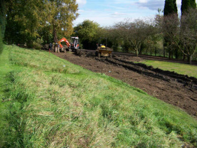 Grass Seeding in Dippenhall, Surrey - Recontouring of large areas of garden with imported topsoil and areas re-seeded on completion. Lawns & Turfing - MDB Landscapes