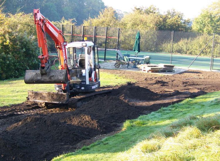 Grass Seeding in Dippenhall, Surrey - Recontouring of large areas of garden with imported topsoil and areas re-seeded on completion. Lawns & Turfing - MDB Landscapes