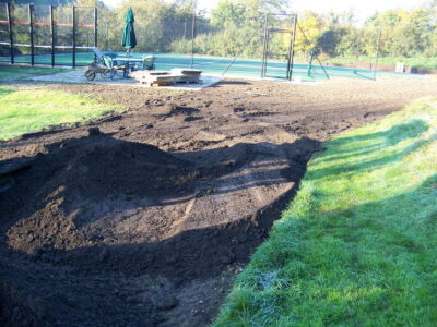 Grass Seeding in Dippenhall, Surrey - Recontouring of large areas of garden with imported topsoil and areas re-seeded on completion. Lawns & Turfing - MDB Landscapes