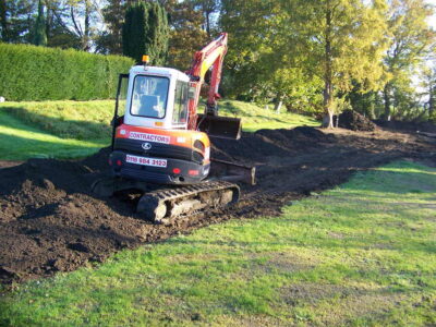 Grass Seeding in Dippenhall, Surrey - Recontouring of large areas of garden with imported topsoil and areas re-seeded on completion. Lawns & Turfing - MDB Landscapes