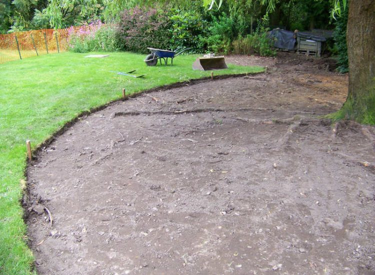 Grey Water Management Winchfield, Hampshire - The clients remit here was to enable the dispersal of excess grey water within their property. The solution proposed involved the controlled discharge of grey water through a drainage layer. Garden Drainage - MDB Landscapes