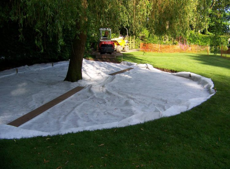 Grey Water Management Winchfield, Hampshire - The clients remit here was to enable the dispersal of excess grey water within their property. The solution proposed involved the controlled discharge of grey water through a drainage layer. Garden Drainage - MDB Landscapes