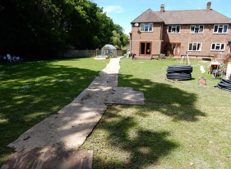 Planting Border Drainage Cranleigh, Surrey - To aid reinstatement of a new boundary hedge a bold drainage solution was required incorporating drainage layers, land drains and the use of a sump and pump. Garden drainage - MDB Landscapes