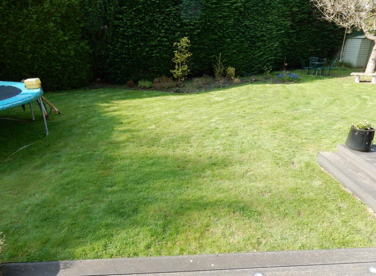 Garden and Lawn Drainage Esher, Surrey - Land drainage was installed here leading to a sump and pump to help with the issues of the clay soil type lawn. Other works included hardwood sleeper raised planting borders and driveway drainage. Garden drainage - MDB Landscapes