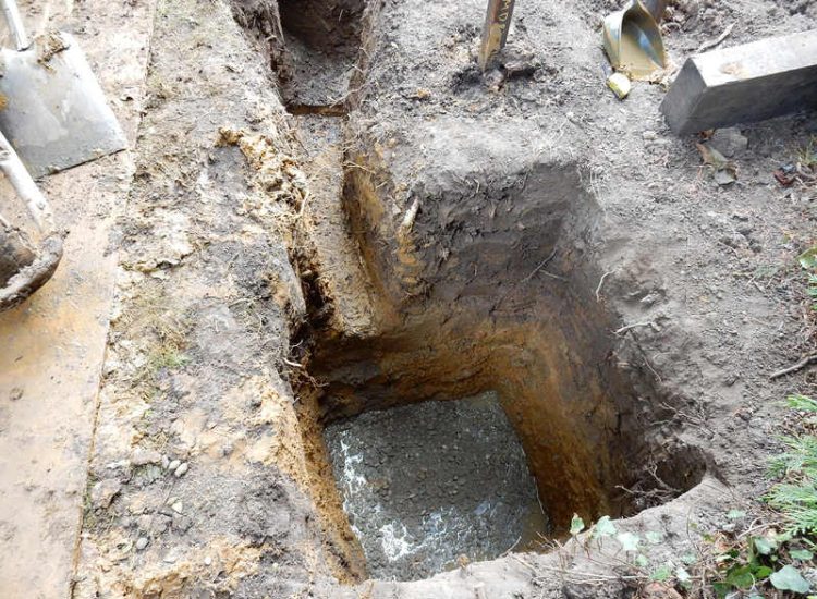 Garden and Lawn Drainage Esher, Surrey - Land drainage was installed here leading to a sump and pump to help with the issues of the clay soil type lawn. Other works included hardwood sleeper raised planting borders and driveway drainage. Garden drainage - MDB Landscapes