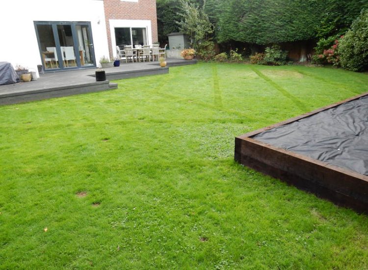 Garden and Lawn Drainage Esher, Surrey - Land drainage was installed here leading to a sump and pump to help with the issues of the clay soil type lawn. Other works included hardwood sleeper raised planting borders and driveway drainage. Garden drainage - MDB Landscapes