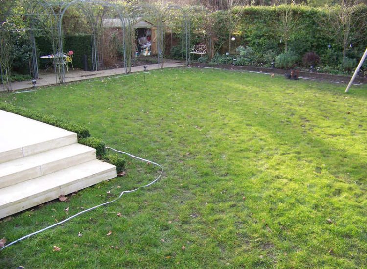 Lawn Drainage London - A poor soil medium left lawn areas very water logged and difficult to manage through out the year. Extensive land drainage was installed, new rootzone medium imported in and lawns re-turfed. Access was also restricted for this project with difficult level changes to contend with. Garden Drainage - MDB Landscapes