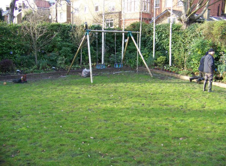 Lawn Drainage London - A poor soil medium left lawn areas very water logged and difficult to manage through out the year. Extensive land drainage was installed, new rootzone medium imported in and lawns re-turfed. Access was also restricted for this project with difficult level changes to contend with. Garden Drainage - MDB Landscapes