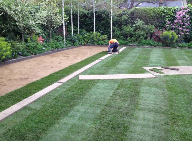 Lawn Drainage London - A poor soil medium left lawn areas very water logged and difficult to manage through out the year. Extensive land drainage was installed, new rootzone medium imported in and lawns re-turfed. Access was also restricted for this project with difficult level changes to contend with. Garden Drainage - MDB Landscapes