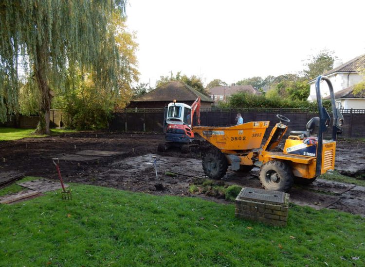 Lawn Drainage Crondall, Hampshire - Land drains, a drainage layer, raising of levels and a new lawn were required for this project to change what was an unusable front garden during both winter and summer months. Garden Drainage - MDB Landscapes