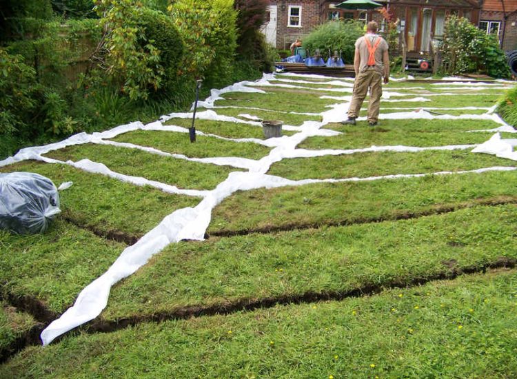 Garden and Lawn Drainage Wormley, Godalming, Surrey - With a very moisture retentive soil type and a constant in ground flow of water this garden remained unusable through out the whole year for the entire family. Garden Drainage - MDB Landscapes