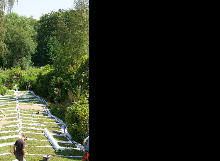 Garden and Lawn Drainage Wormley, Godalming, Surrey - With a very moisture retentive soil type and a constant in ground flow of water this garden remained unusable through out the whole year for the entire family. Garden Drainage - MDB Landscapes