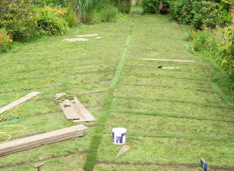 Garden and Lawn Drainage Wormley, Godalming, Surrey - With a very moisture retentive soil type and a constant in ground flow of water this garden remained unusable through out the whole year for the entire family. Garden Drainage - MDB Landscapes