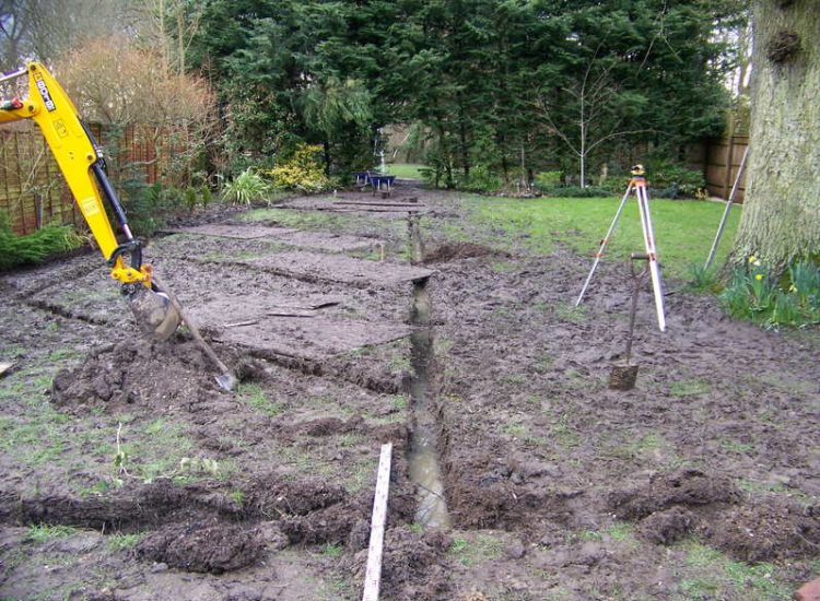 Turfing and Drainage in Winchester, Hampshire - Drainage issues were dealt with first to enable the laying of two new areas of lawn. Lawns & Turfing - MDB Landscapes
