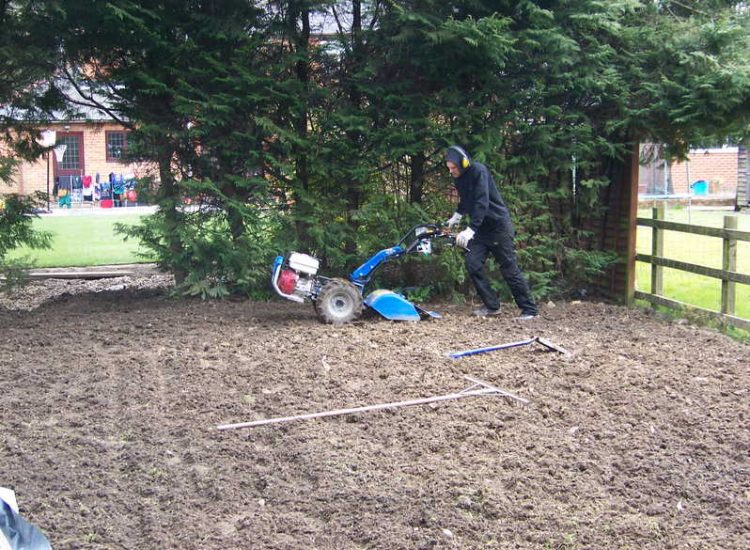 Turfing and Drainage in Winchester, Hampshire - Drainage issues were dealt with first to enable the laying of two new areas of lawn. Lawns & Turfing - MDB Landscapes