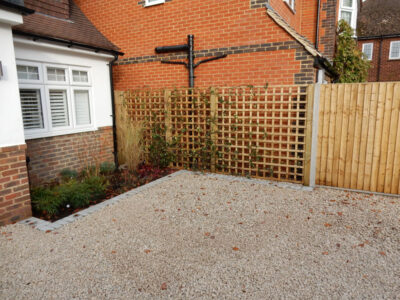 Decorative Aggregate Driveway Farnham, Surrey, GU9 - Old English limestone chippings framed with a crisp and neat edging of sawn granite setts. Decorative Aggregate Driveway Farnham, Surrey, GU9 - Old English limestone chippings framed with a crisp and neat edging of sawn granite setts.