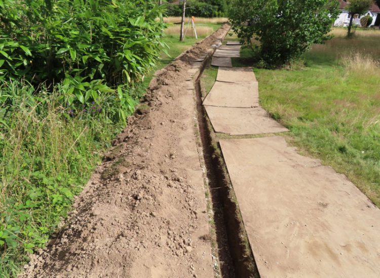 Driveway Flooding Cranleigh, Surrey, GU6 - Constant flooding of a shingled driveway area, preventing its use and causing access issues to the house. Driveway Flooding Cranleigh, Surrey, GU6 - Constant flooding of a shingled driveway area, preventing its use and causing access issues to the house.