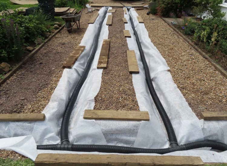 Driveway Flooding Cranleigh, Surrey, GU6 - Constant flooding of a shingled driveway area, preventing its use and causing access issues to the house. Driveway Flooding Cranleigh, Surrey, GU6 - Constant flooding of a shingled driveway area, preventing its use and causing access issues to the house.