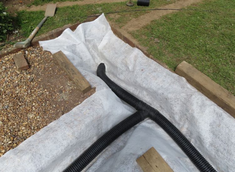 Driveway Flooding Cranleigh, Surrey, GU6 - Constant flooding of a shingled driveway area, preventing its use and causing access issues to the house. Driveway Flooding Cranleigh, Surrey, GU6 - Constant flooding of a shingled driveway area, preventing its use and causing access issues to the house.