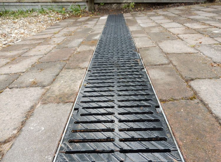 Driveway Drainage Fleet, Hampshire, GU52 - Occasional flooding from extreme rainfall events causing flooding of the driveway and preventing access to the property.