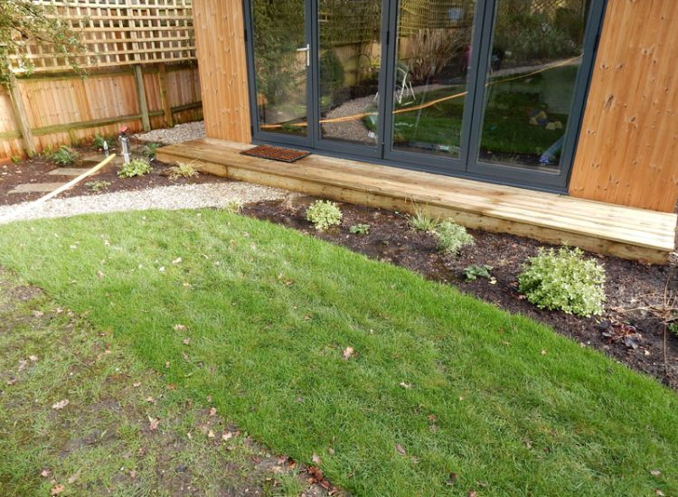 Drainage to Protect Garden Building Forest Hill, London, SE23 - A garden building installed within the lowest point of the garden with ingress from neighbouring land and the clients own garden, threatening the structure and restricting access. Drainage to Protect Garden Building Forest Hill, London, SE23 - A garden building installed within the lowest point of the garden with ingress from neighbouring land and the clients own garden, threatening the structure and restricting access.