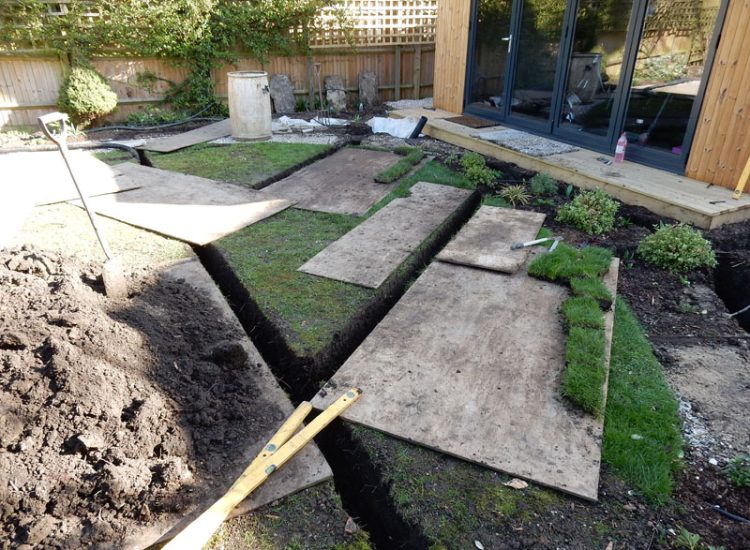 Drainage to Protect Garden Building Forest Hill, London, SE23 - A garden building installed within the lowest point of the garden with ingress from neighbouring land and the clients own garden, threatening the structure and restricting access. Drainage to Protect Garden Building Forest Hill, London, SE23 - A garden building installed within the lowest point of the garden with ingress from neighbouring land and the clients own garden, threatening the structure and restricting access.