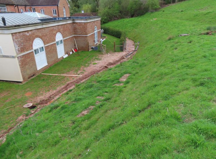 Garden Drainage in Chiddingfold, Godalming, Surrey, GU8 - Failing drainage infrastructure and runoff from a steep emabankment. Garden Drainage in Chiddingfold, Godalming, Surrey, GU8 - Failing drainage infrastructure and runoff from a steep emabankment.
