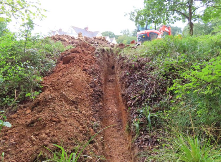 Garden Drainage in Chiddingfold, Godalming, Surrey, GU8 - Failing drainage infrastructure and runoff from a steep emabankment. Garden Drainage in Chiddingfold, Godalming, Surrey, GU8 - Failing drainage infrastructure and runoff from a steep emabankment.