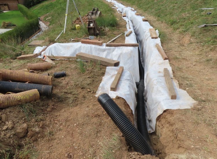Garden Drainage in Chiddingfold, Godalming, Surrey, GU8 - Failing drainage infrastructure and runoff from a steep emabankment. Garden Drainage in Chiddingfold, Godalming, Surrey, GU8 - Failing drainage infrastructure and runoff from a steep emabankment.