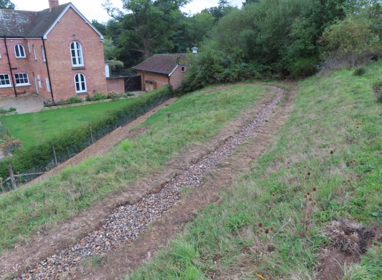 Garden Drainage in Chiddingfold, Godalming, Surrey, GU8 - Failing drainage infrastructure and runoff from a steep emabankment. Garden Drainage in Chiddingfold, Godalming, Surrey, GU8 - Failing drainage infrastructure and runoff from a steep emabankment.