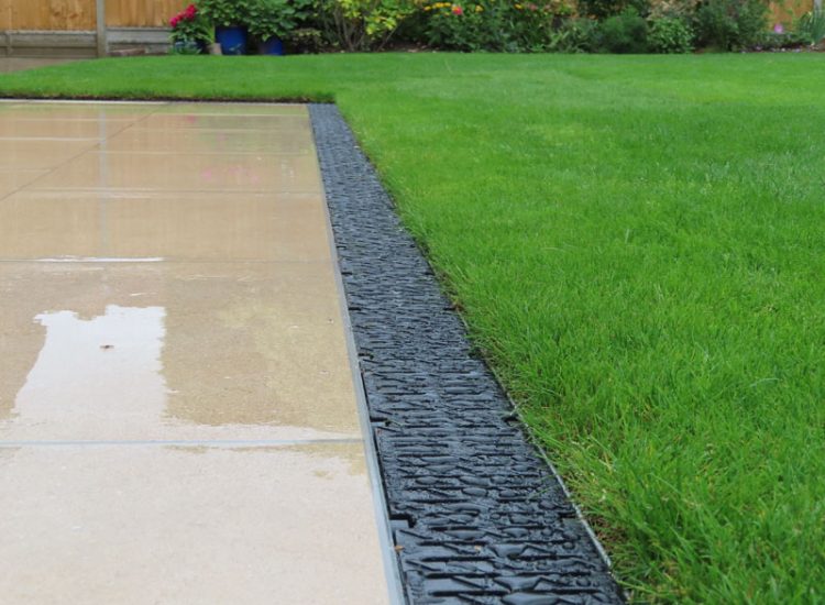 Garden Drainage and Landscaping Sandhurst, Berkshire, GU47 - Garden drainage was part of this project to assist in a new lawn, planting border areas and a new paved terrace.