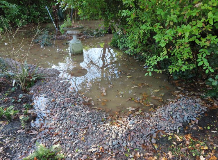 Garden Drainage and Landscaping Surbiton, Greater London, KT6 - A problematic area of garden prone to flooding due to ingress from a neighbouring property. Garden Drainage and Landscaping Surbiton, Greater London, KT6 - A problematic area of garden prone to flooding due to ingress from a neighbouring property.