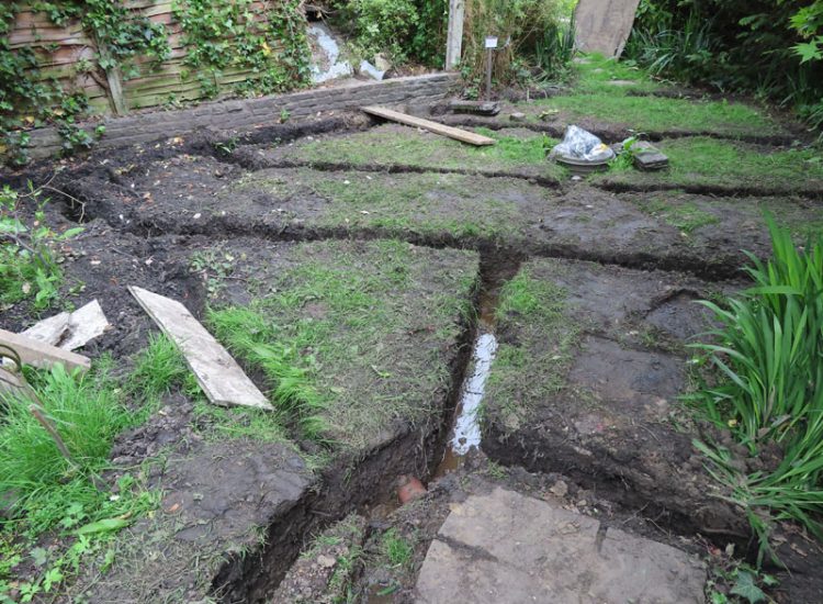 Garden Drainage and Landscaping Surbiton, Greater London, KT6 - A problematic area of garden prone to flooding due to ingress from a neighbouring property. Garden Drainage and Landscaping Surbiton, Greater London, KT6 - A problematic area of garden prone to flooding due to ingress from a neighbouring property.