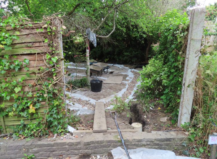 Garden Drainage and Landscaping Surbiton, Greater London, KT6 - A problematic area of garden prone to flooding due to ingress from a neighbouring property. Garden Drainage and Landscaping Surbiton, Greater London, KT6 - A problematic area of garden prone to flooding due to ingress from a neighbouring property.