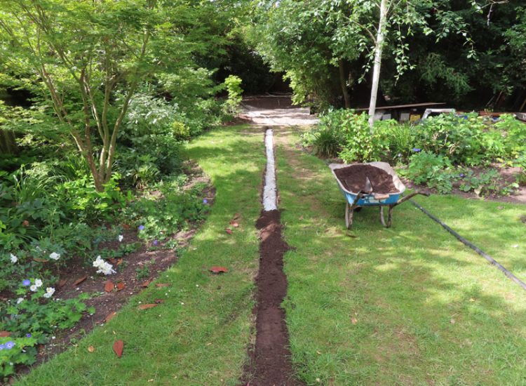 Garden Drainage and Landscaping Surbiton, Greater London, KT6 - A problematic area of garden prone to flooding due to ingress from a neighbouring property. Garden Drainage and Landscaping Surbiton, Greater London, KT6 - A problematic area of garden prone to flooding due to ingress from a neighbouring property.