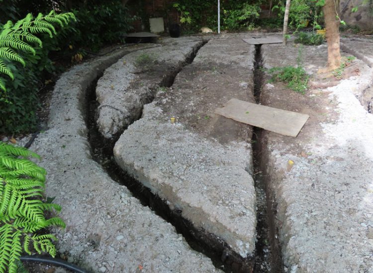 Garden Drainage and Landscaping Surbiton, Greater London, KT6 - A problematic area of garden prone to flooding due to ingress from a neighbouring property. Garden Drainage and Landscaping Surbiton, Greater London, KT6 - A problematic area of garden prone to flooding due to ingress from a neighbouring property.