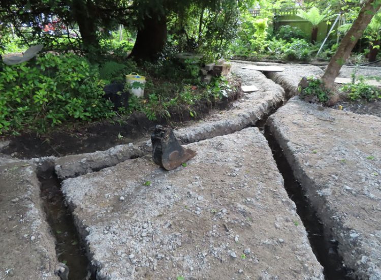 Garden Drainage and Landscaping Surbiton, Greater London, KT6 - A problematic area of garden prone to flooding due to ingress from a neighbouring property. Garden Drainage and Landscaping Surbiton, Greater London, KT6 - A problematic area of garden prone to flooding due to ingress from a neighbouring property.