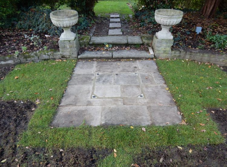 Lawn and Garden Drainage Dulwich, London, SE21 - Following an extensive house development and installation of soakaways within lawn areas, major flooding issues occured within a lower neighbouring garden.