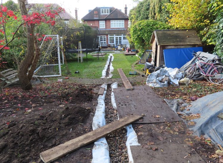 Lawn and Garden Drainage East Finchley, London, N2 - Runoff from allotments causing persistent issues creating unmanagable lawn areas and preventing installation of a garden building. Lawn and Garden Drainage East Finchley, London, N2 - Runoff from allotments causing persistent issues creating unmanagable lawn areas and preventing installation of a garden building.